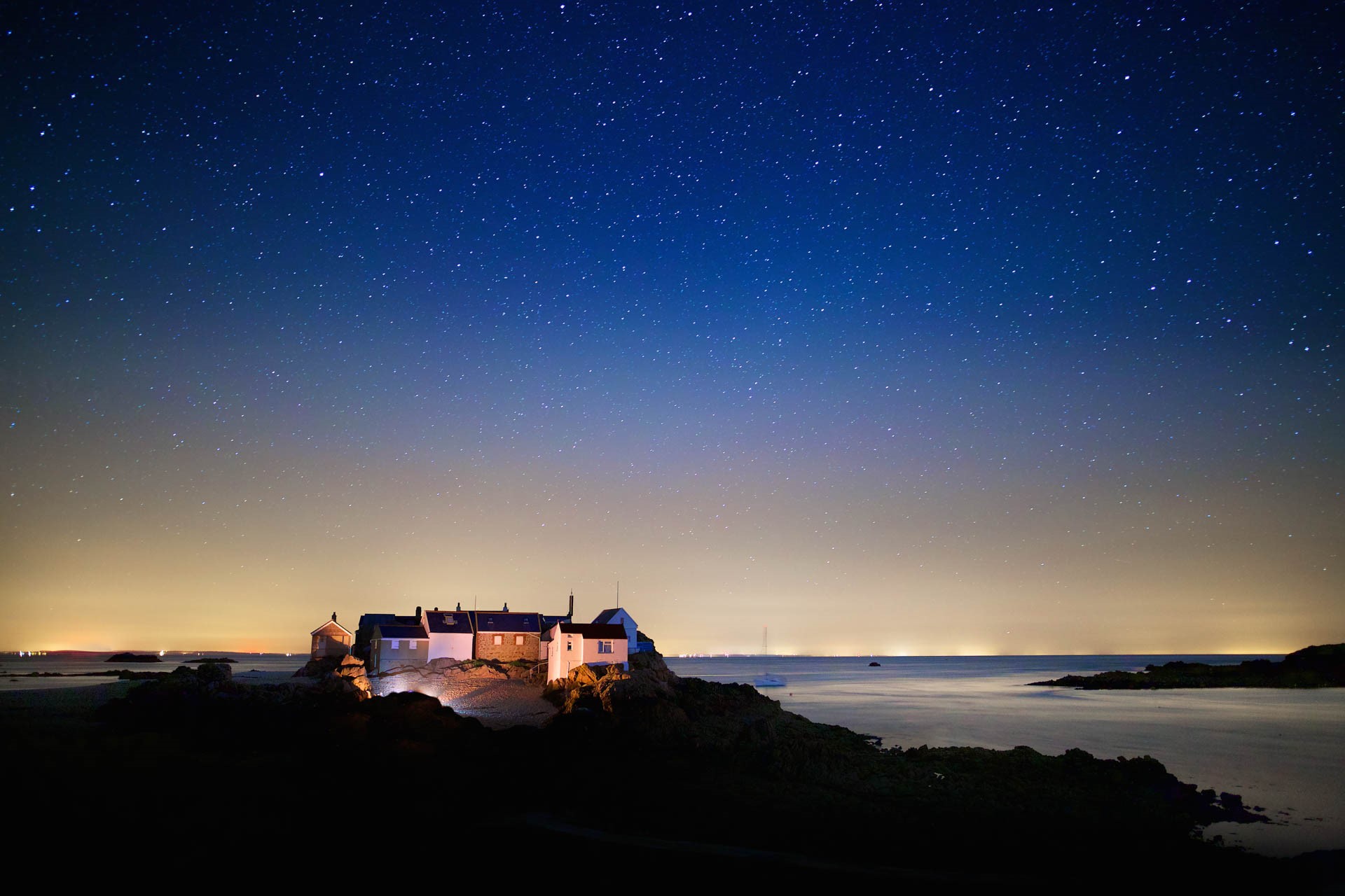 Les Ecrehous houses at night
