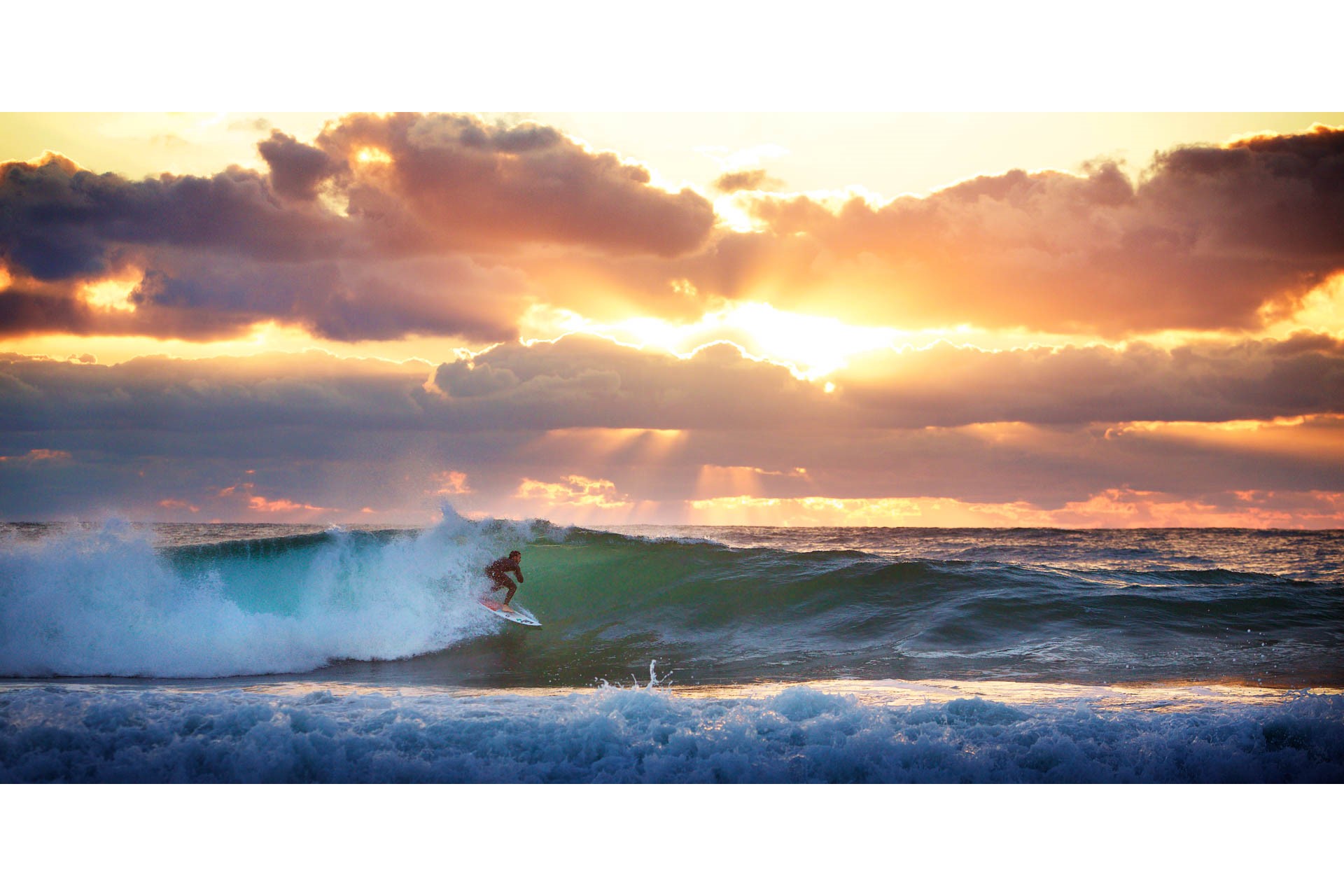 Sunset surfer at St Ouen's Bay