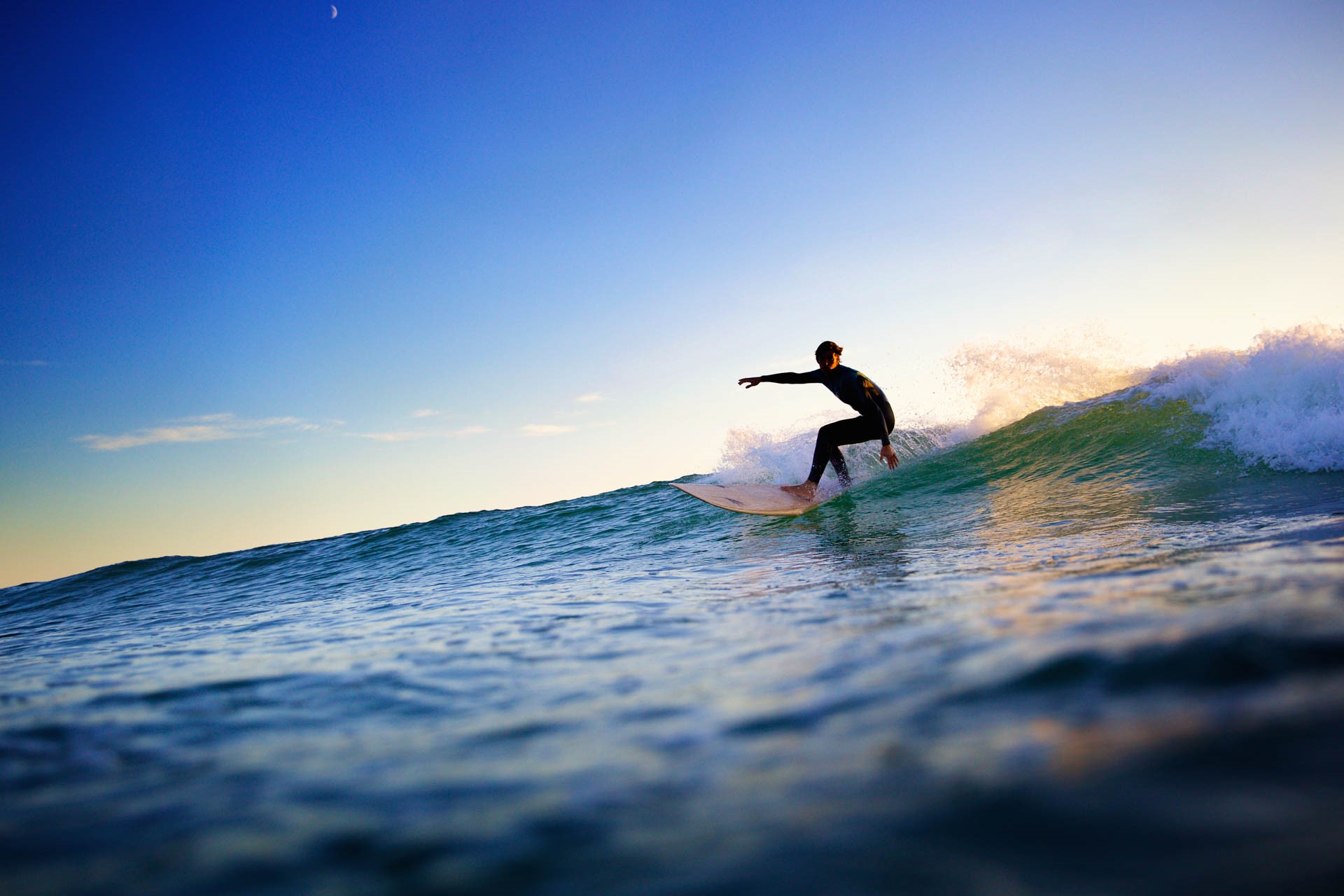 Surfer Catching a Wave at St Ouen